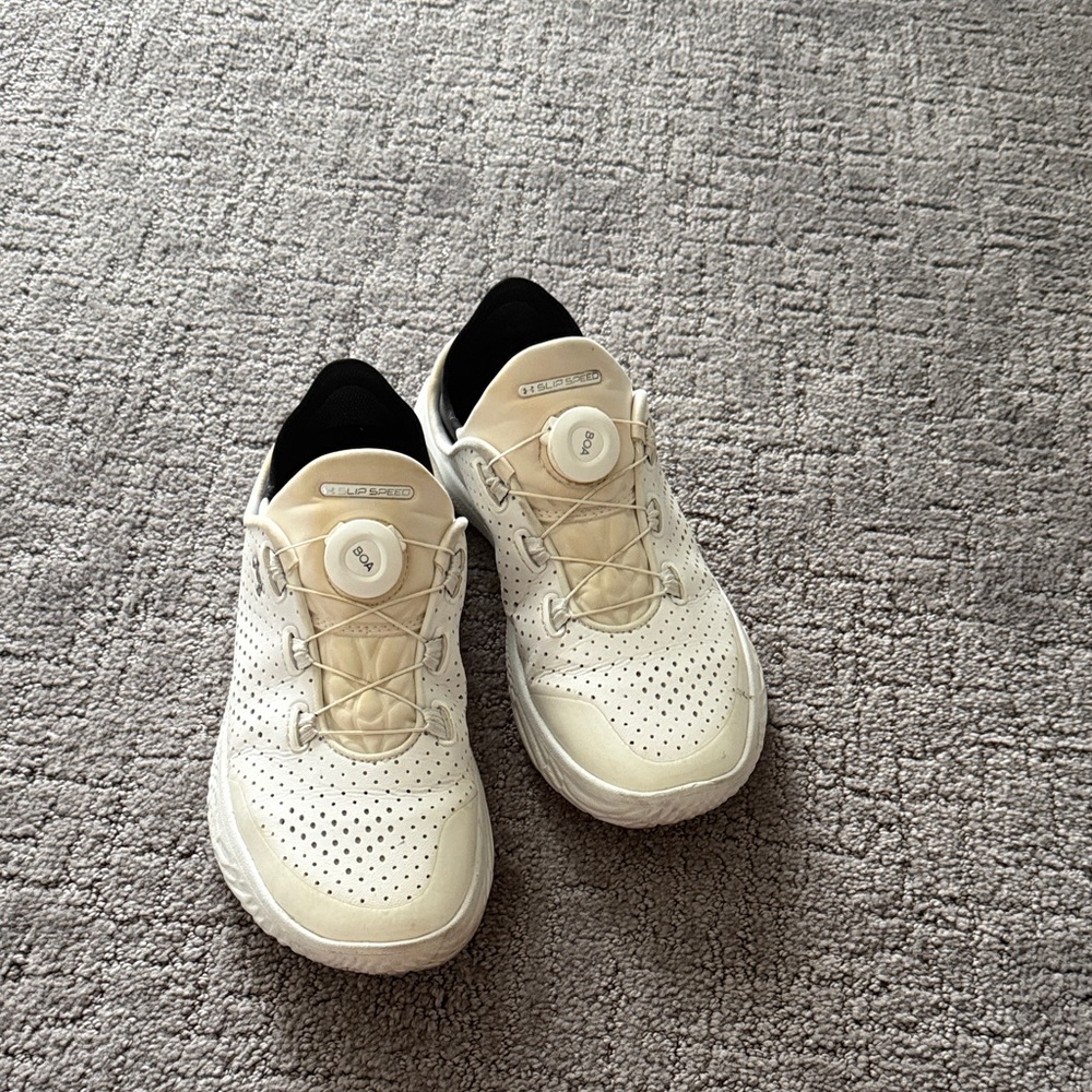 Under Armour White Cream Athletic Shoes with Black Collar